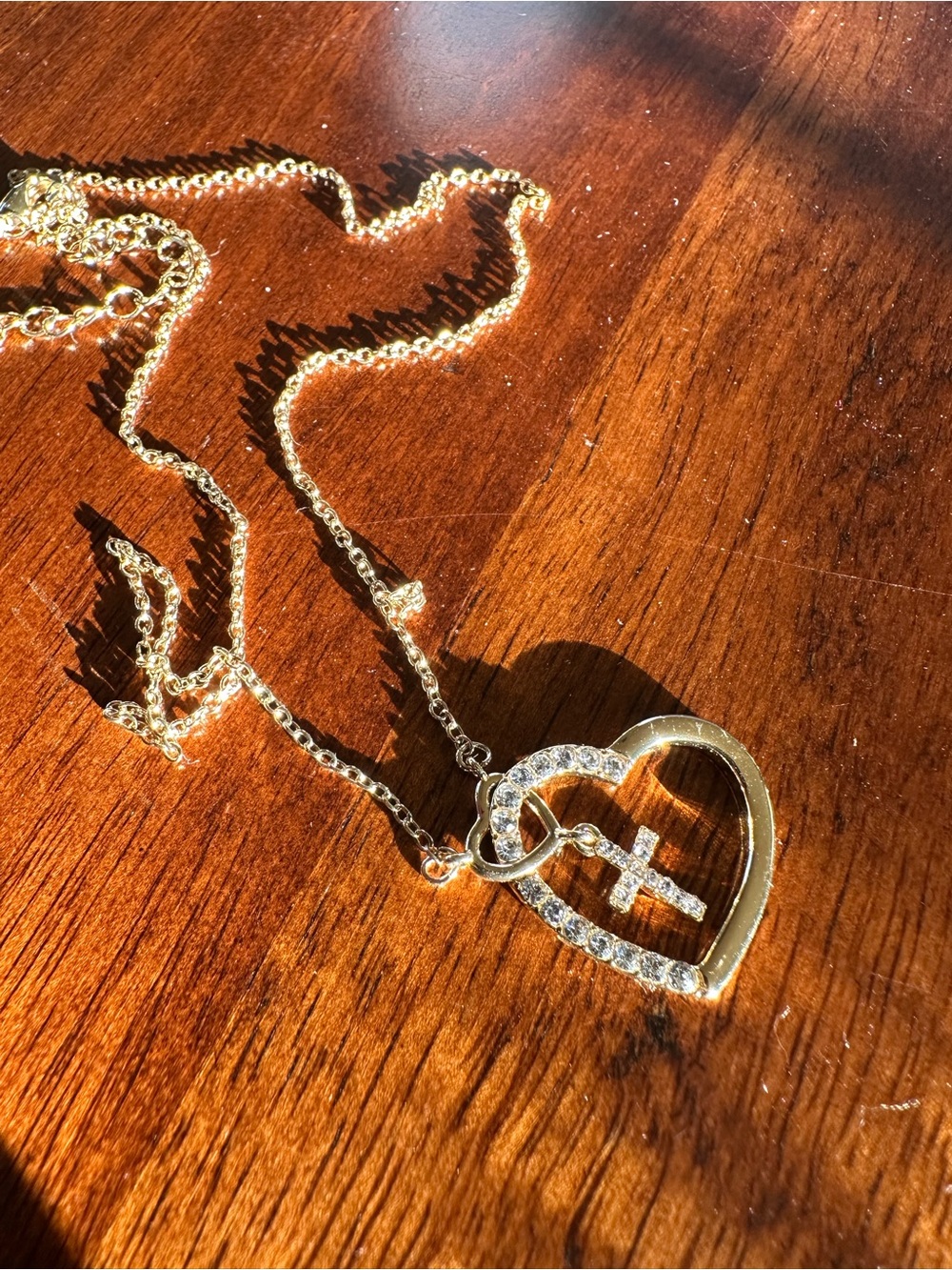 Gold Heart Pendant Necklace with Crystal Cross Accent